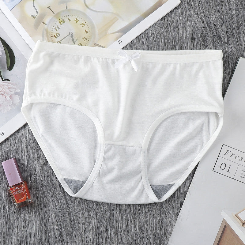 Figi dziewczęce o średnim stanie z elastycznymi bokami Tomiko Biały