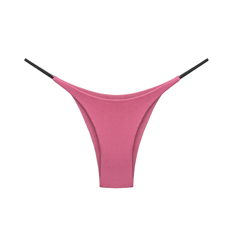 Stringi z delikatnym paskiem niewidoczne pod ubraniem Ronalda Różowy