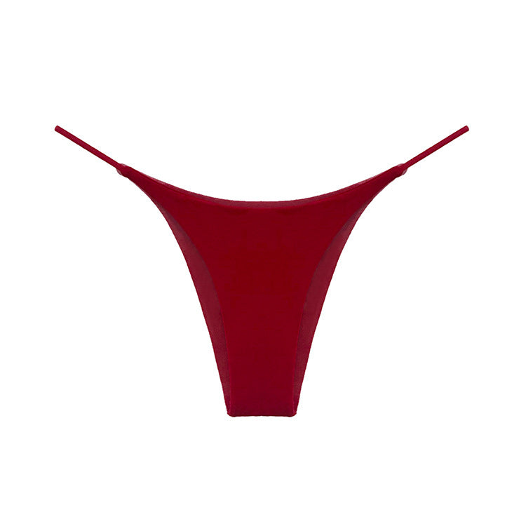 Stringi z delikatnym paskiem niewidoczne pod ubraniem Ronalda Czerwony