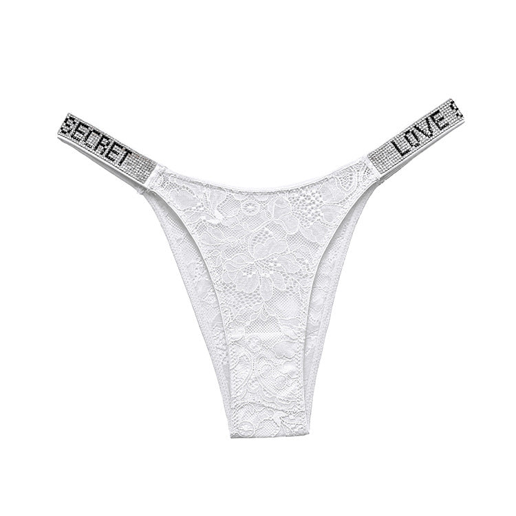 Stringi z szerokim paskiem i ozdobnymi detalami Rakita Biały