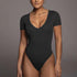 Body z krótkim rękawem i dekoltem V elastyczne Ieteke Czarny