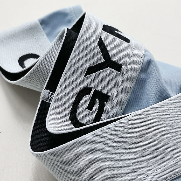 Stringi sportowe z elastycznego materiału na treningi Ayla