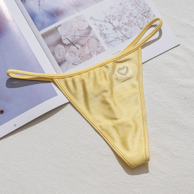 Stringi z wysokim wycięciem idealne pod obcisłe ubrania Domiziana Żółty