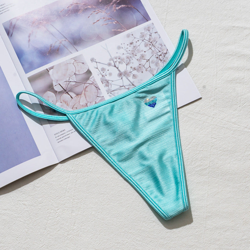 Stringi z wysokim wycięciem idealne pod obcisłe ubrania Domiziana Niebieski